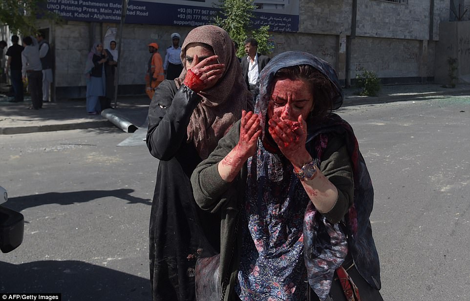 http://i.dailymail.co.uk/i/pix/2017/05/31/08/40F4115300000578-4557562-Wounded_Afghan_women_were_seen_running_from_the_scene_of_the_att-a-33_1496216849155.jpg